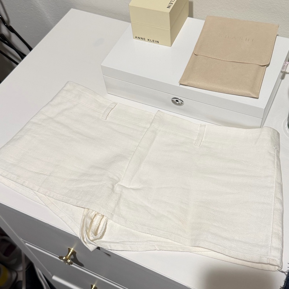 Lioness Cream Low-Rise Mini Skirt